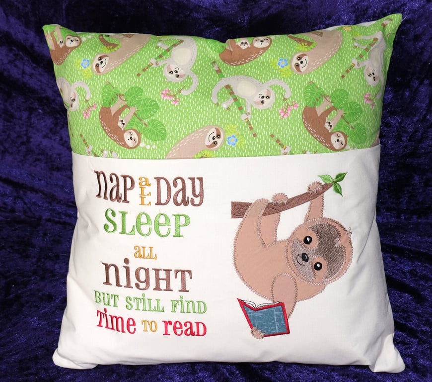 Embroidered sloth reading cushion 