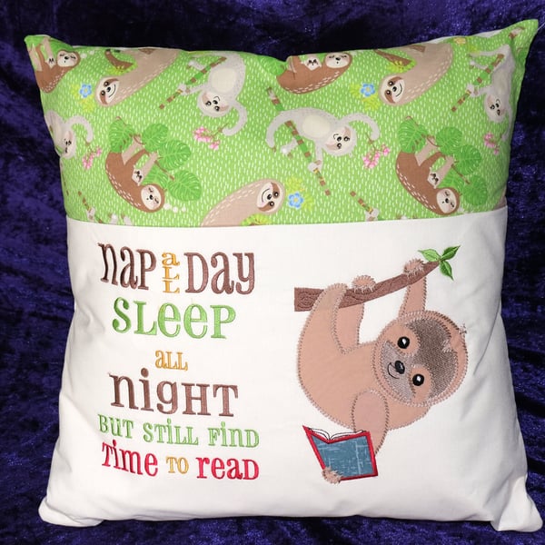 Embroidered sloth reading cushion 