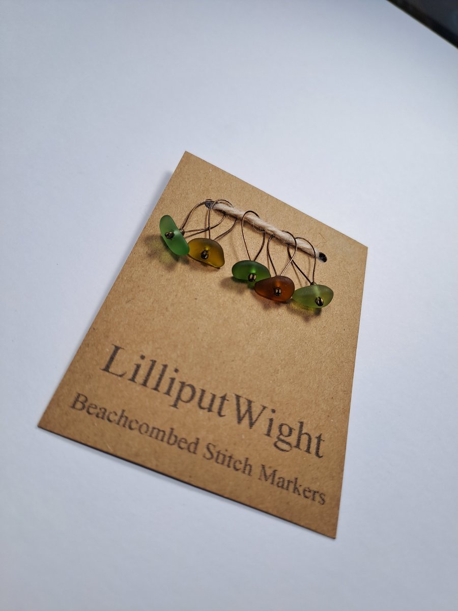 Five green and brown sea glass stitch markers