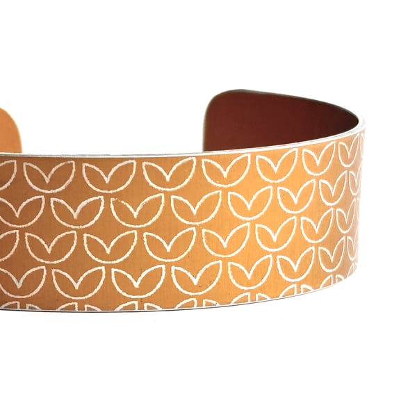 Leaf pattern aluminium cuff mustard