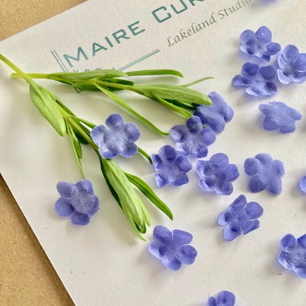 Silk Satin Forget me not Flowers in shades of blue.