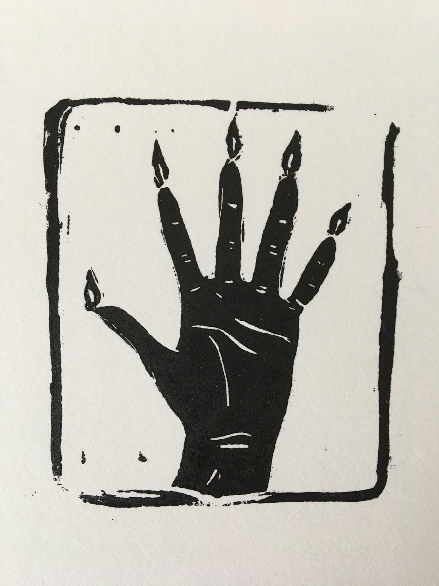 Handmade linocut print on paper, Hand of Glory. 