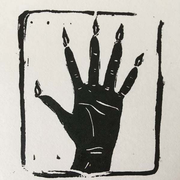 Handmade linocut print on paper, Hand of Glory. 