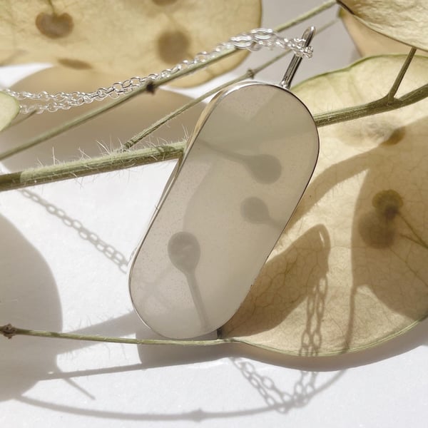 Honesty seed pod pendant. Silver or brass