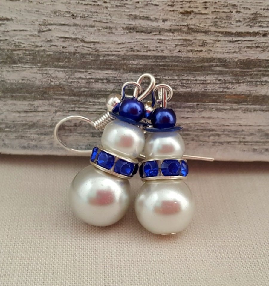 Blue and white pearly snowmen earrings