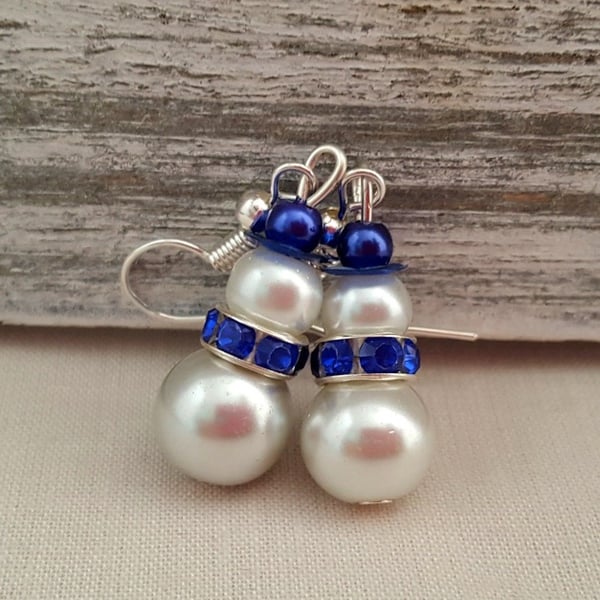 Blue and white pearly snowmen earrings