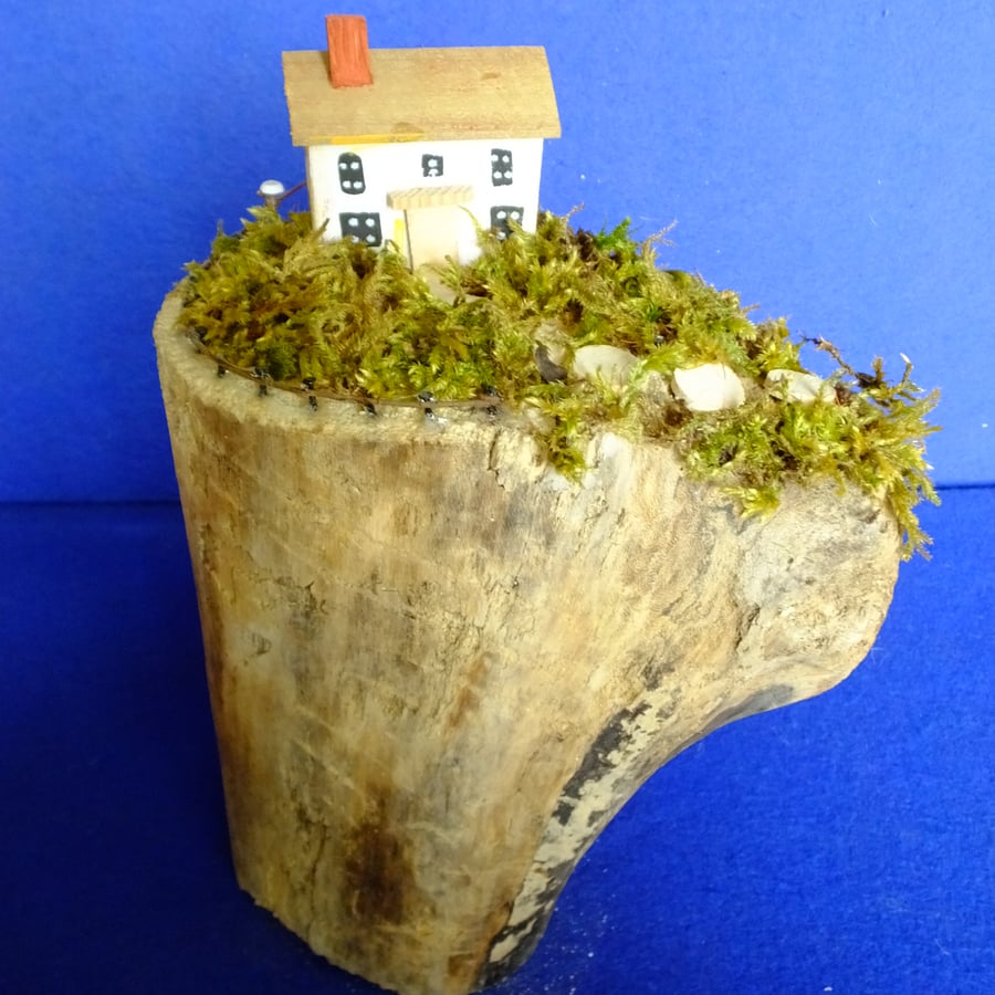 Clifftop cottage scene with secret tunnel from chunk of Cornish driftwood  