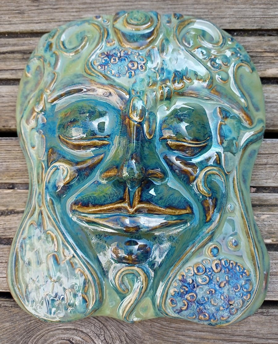 Greenman, stylised wall hanging face