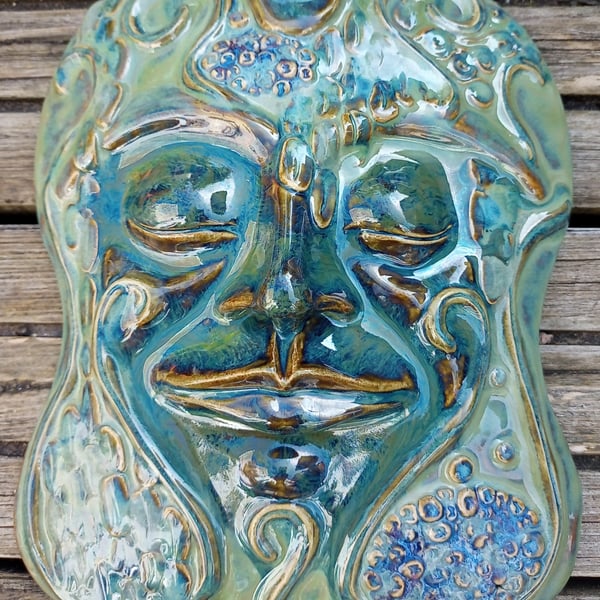 Greenman, stylised wall hanging face