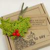 Crochet Holly Brooch on a Gift Tag