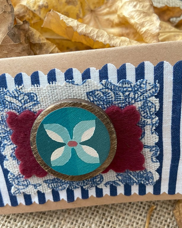 Wooden Floral brooch with blues and orange perfectly imperfect