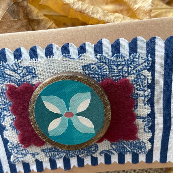 Wooden Floral brooch with blues and orange perfectly imperfect