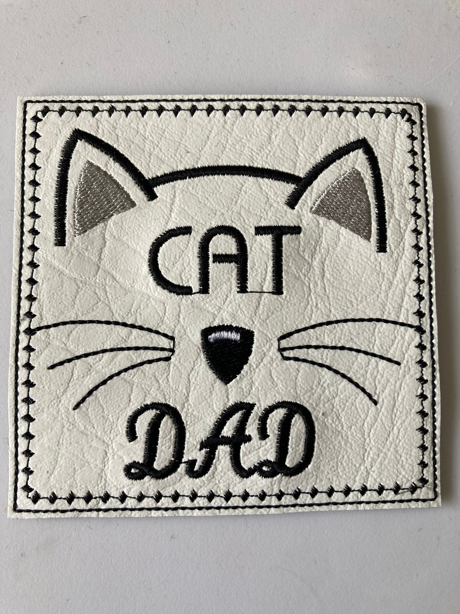 710. Cat dad coaster.