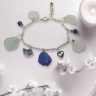 Sea glass charm bracelet blue, Seafoam & white pieces of seaglass. St 
