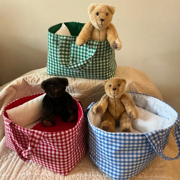 Handmade Fabric Carry Basket, with teddy bear, bedding and crocheted blanket