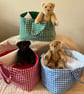 Handmade Fabric Carry Basket, with teddy bear, bedding and crocheted blanket