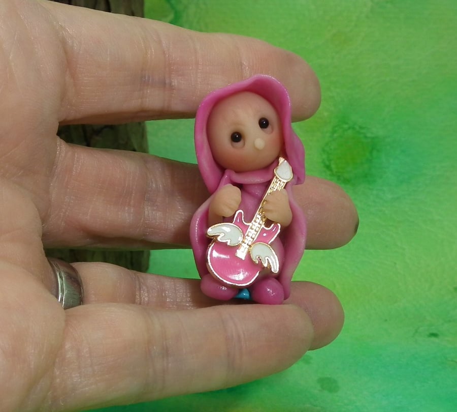Tiny Minstrel Gnome 'Monica' with enamel guitar OOAK Sculpt Ann Galvin