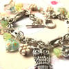 Silver Owl Charm Bracelet with Hearts and Flowers