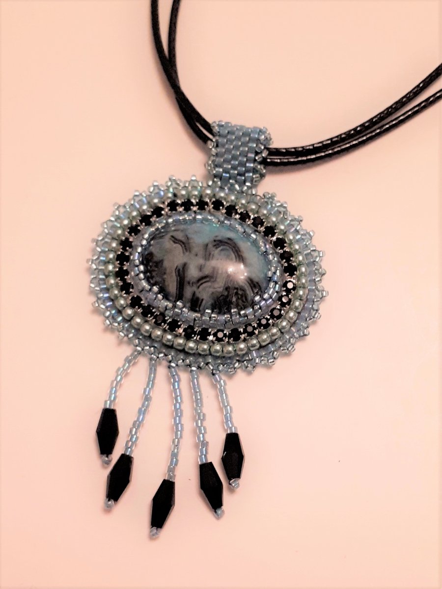 Fringed Bead embroidered Cabochon pendant on leather type cord necklace