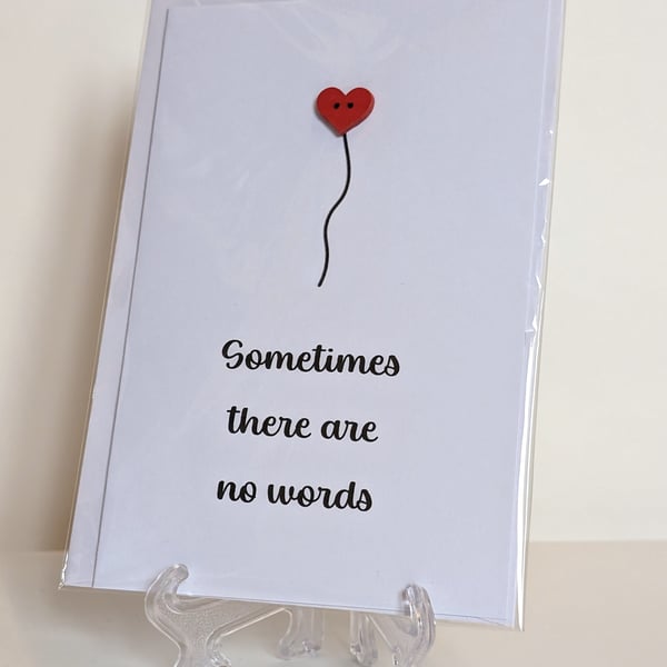 Sympathy card "Sometimes there are no words" with a red heart button 