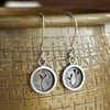 Little silver seedling mismatched drop earrings