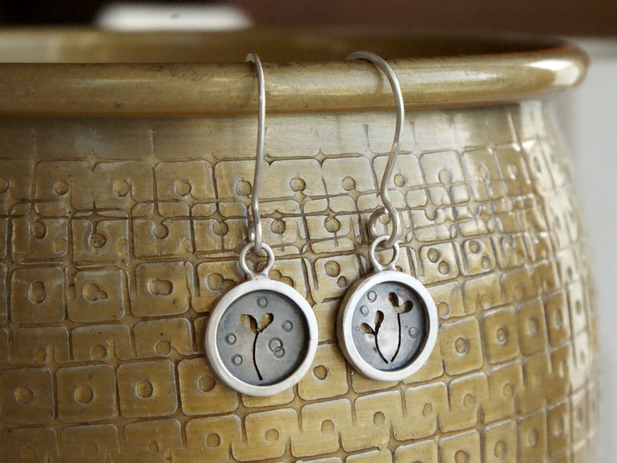 Little silver seedling mismatched drop earrings