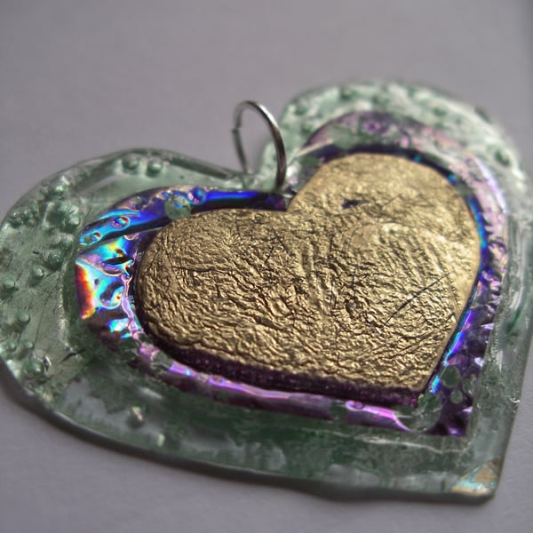 Colourful reflective heart pendant.