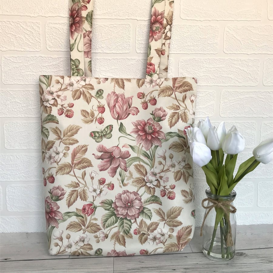 Pink patterned tote bag with flowers, wild strawberries and butterflies