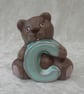 Ceramic Hand Painted Small Brown Alphabet Bear C Animal Figurine Ornament. - Image 1