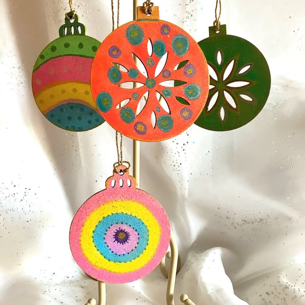 4 hand painted Christmas tree decorations