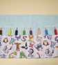 Animal Alphabet Fabric Pencil Roll includes 8 pencils - Image 1