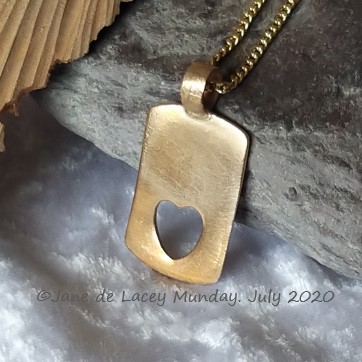 Bronze Pendant with Heart Apperture