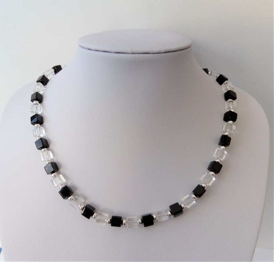 Black and clear glass cube bead necklace.
