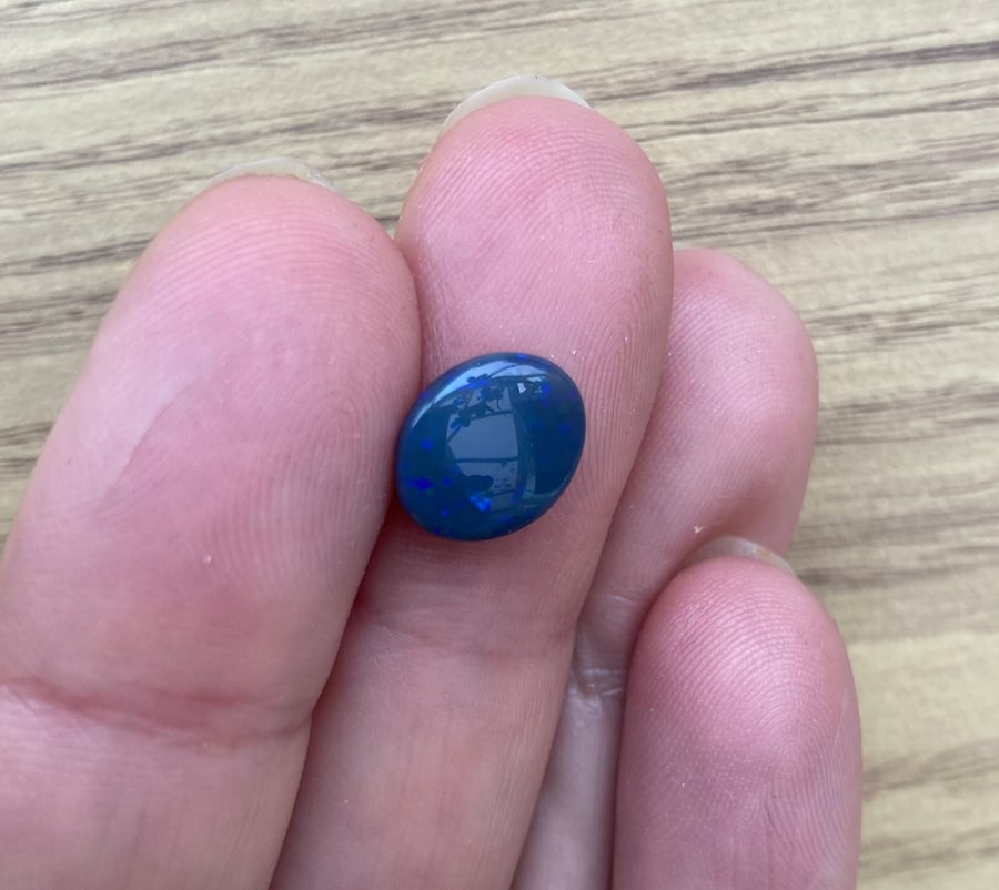 Beautiful Midnight Blue Galaxy Opal Cabochon from Lightning Ridge, Australia.