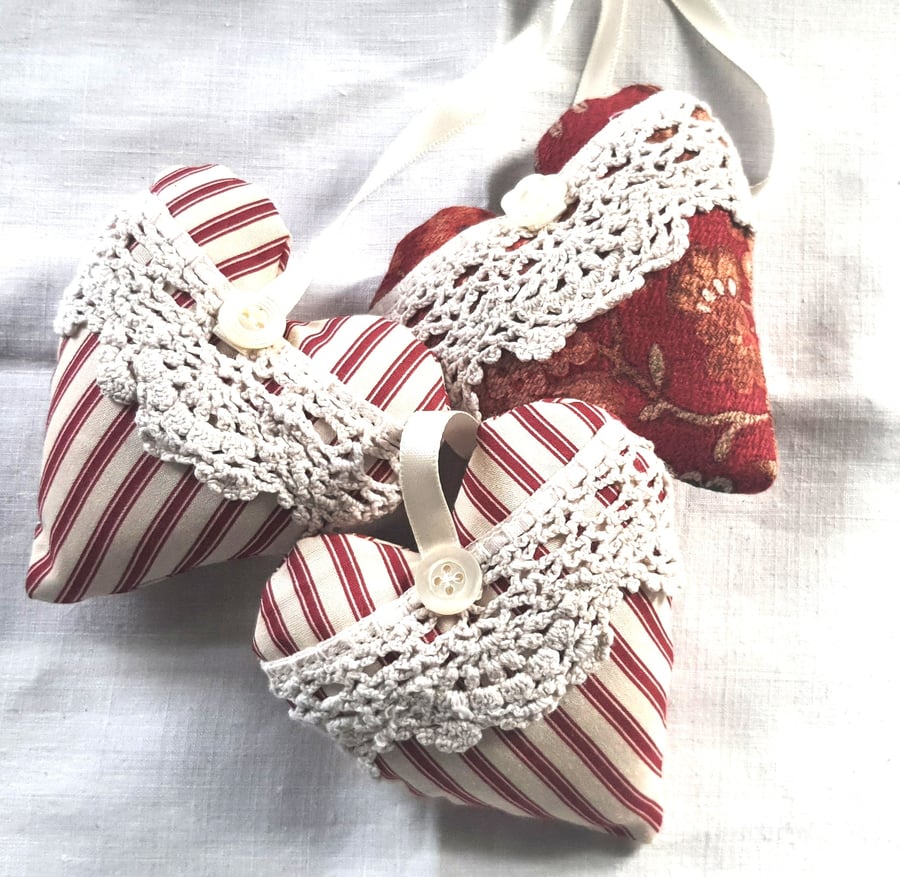 Set of three vintage fabric and ticking hearts