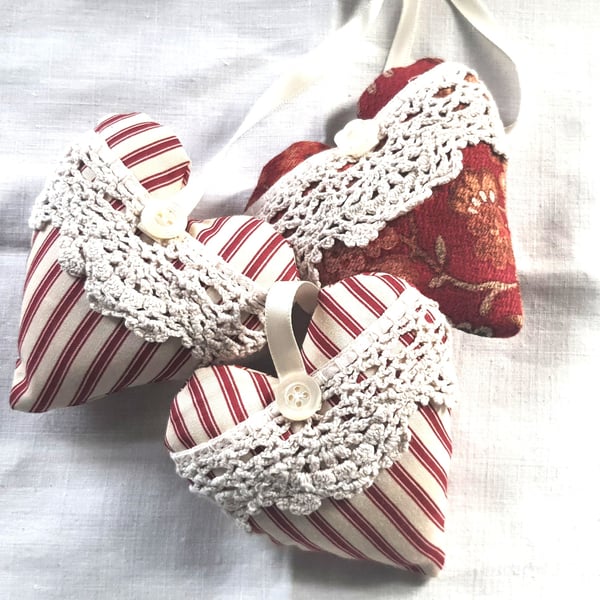 Set of three vintage fabric and ticking hearts