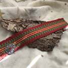 Hand woven bookmark with tear drop adornment