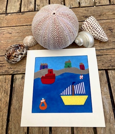 Ships sailing by textile picture.