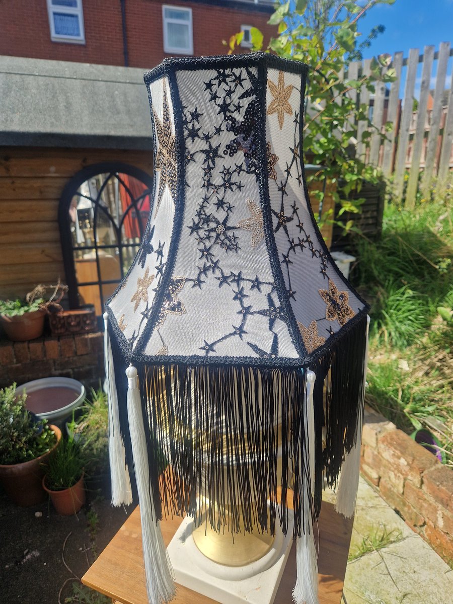 handmade lampshade with sequin stars and tassels, maximalist home decor