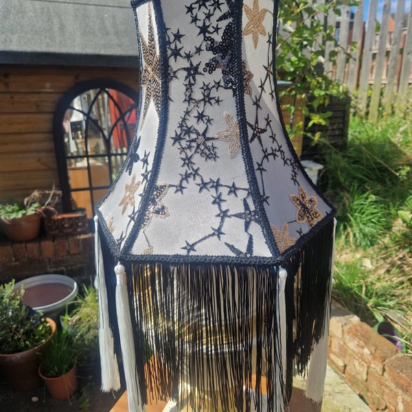 handmade lampshade with sequin stars and tassels, maximalist home decor