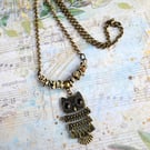 Antique Bronze Owl Pendant with Natural Dalmatian Jasper and Black Onyx