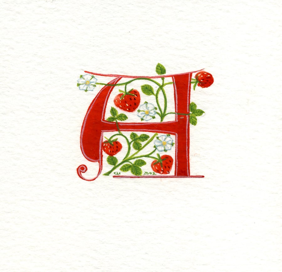 Letter 'A' in red with strawberries custom letters.