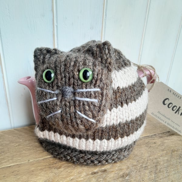 Handknitted cat tea cosy