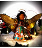 Large: Orange Tin Angel Christmas tree topper - Image 2