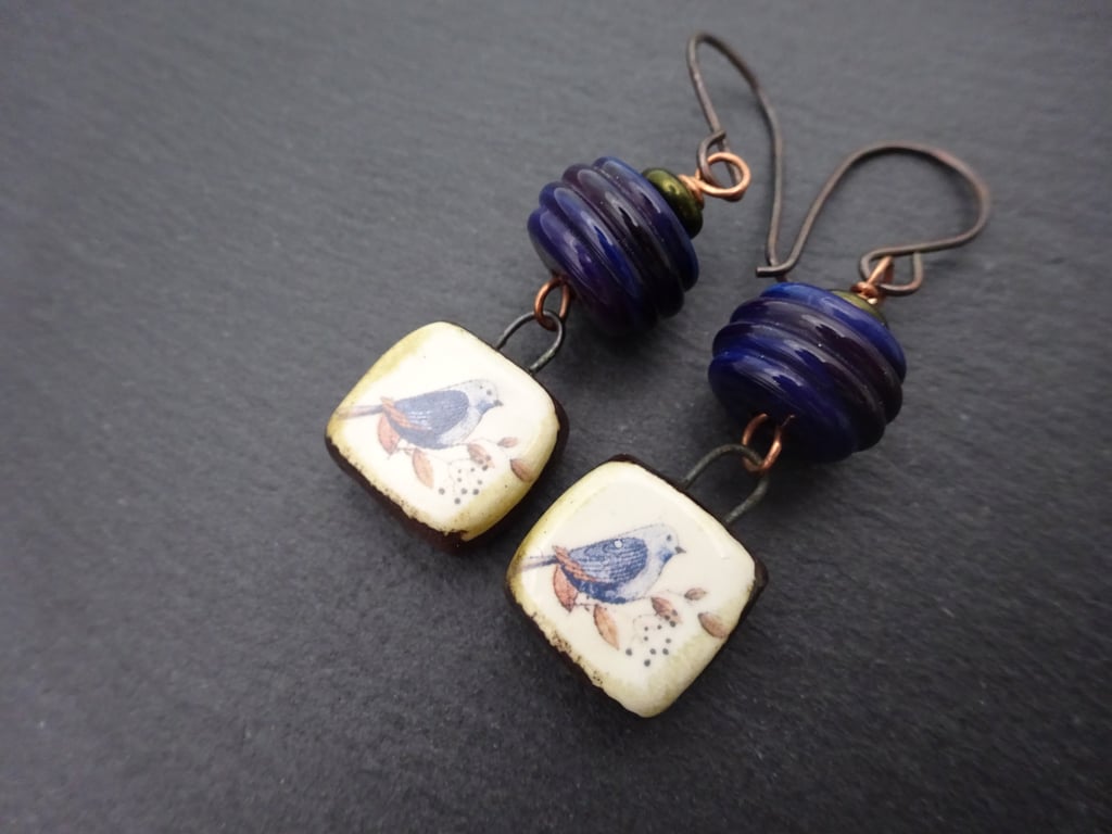 blue bird lampwork glass earrings, copper and ceramic jewellery