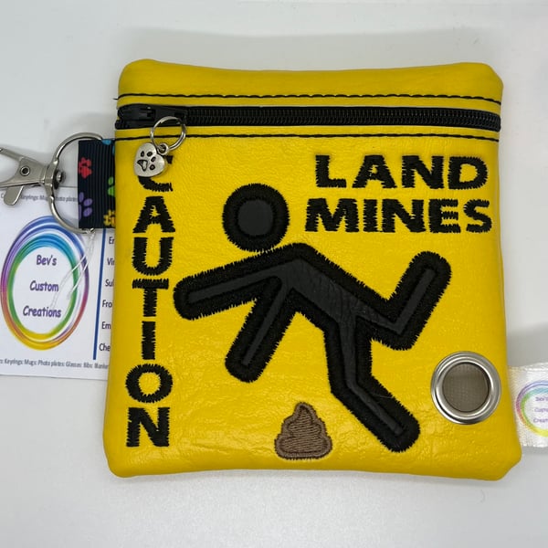 Land mines Embroidered Poo bag dispenser.