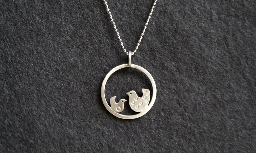 Silver chickenish necklace