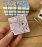 Coptic Bound Tiny Floral Watercolour Sketchbook. Pink, green and gold.