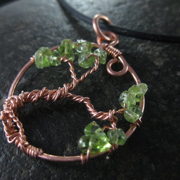 Copper and peridot tree of life pendant