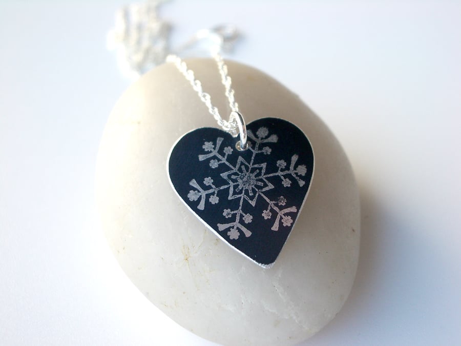 Christmas snowflake heart pendant in black